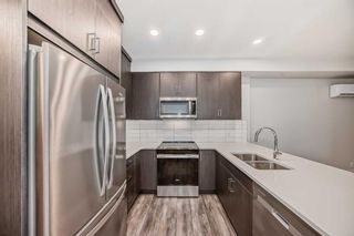 Photo 11: 103 55 Wolf Hollow Crescent SE in Calgary: C-281 Apartment for sale : MLS®# A2145848