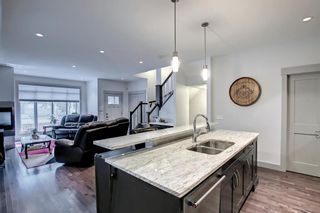 Photo 7: 140 12 Avenue NW in Calgary: Crescent Heights Row/Townhouse for sale : MLS®# A1217492