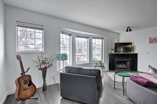 Photo 2: 49 Patina View SW in Calgary: Patterson Row/Townhouse for sale : MLS®# A2034068