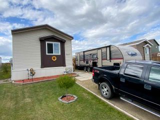 Photo 1: 8610 79A Street in Fort St. John: Fort St. John - City SE Manufactured Home for sale in "WINDFIELD ESTATES" (Fort St. John (Zone 60))  : MLS®# R2484457