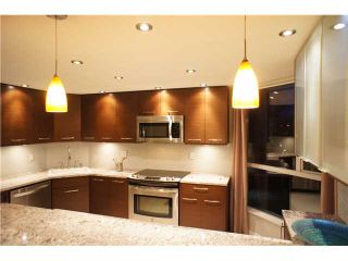 Photo 2: 301 1185 QUAYSIDE Drive in New Westminster: Quay Condo for sale in "RIVIERA MANSIONS" : MLS®# V1000019