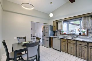 Photo 11: 335 Queensland Place SE in Calgary: Queensland Detached for sale : MLS®# A1137041