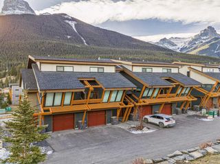 Photo 1: 202 105 Stewart Creek Rise: Canmore Row/Townhouse for sale : MLS®# A2127516