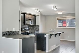 Photo 10: 212 Walden Drive SE in Calgary: Walden Row/Townhouse for sale : MLS®# A1236888