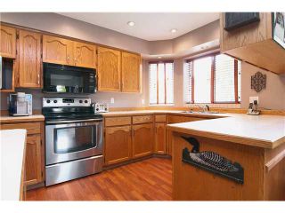 Photo 2: 2397 COLONIAL Drive in Port Coquitlam: Citadel PQ House for sale in "CITADEL HEIGHTS" : MLS®# V948697