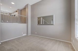 Photo 2: 790 Tuscany Drive NW in Calgary: Tuscany Row/Townhouse for sale : MLS®# A2109257