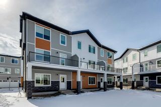 Photo 2: 801 335 Creekside Boulevard SW in Calgary: C-168 Row/Townhouse for sale : MLS®# A2118234