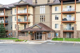 Photo 1: 1107 92 Crystal Shores Road: Okotoks Apartment for sale : MLS®# A2003628