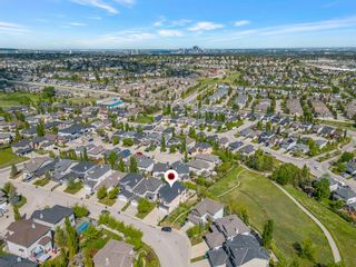 Photo 1: 138 Springbluff Heights SW in Calgary: Springbank Hill Detached for sale : MLS®# A2051713