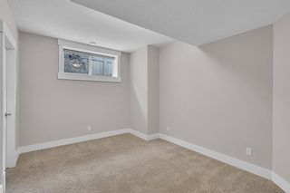 Photo 31: 21 Murmansk Way SW in Calgary: Currie Barracks Detached for sale : MLS®# A2029100