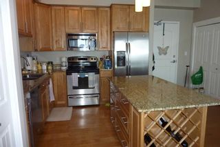 Photo 3: 402 5901 71 Ave: Rocky Mountain House Apartment for sale : MLS®# A2100416