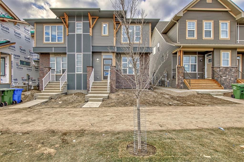 Main Photo: 20865 Main Street SE in Calgary: Seton Semi Detached (Half Duplex) for sale : MLS®# A2095931
