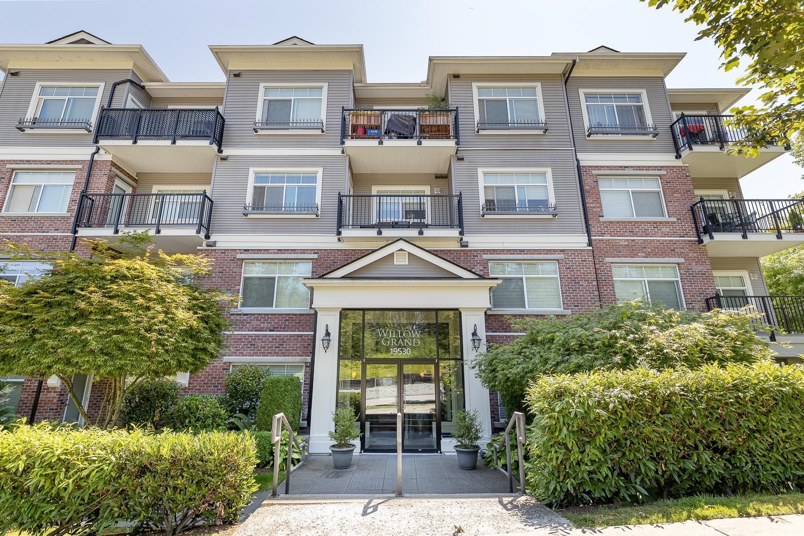Main Photo: 207 19530 65 Avenue in Surrey: Clayton Condo for sale in "Willow Grand" (Cloverdale)  : MLS®# R2713959