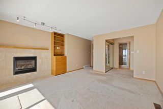 Photo 15: 28 Stradwick Way SW in Calgary: Strathcona Park Detached for sale : MLS®# A2124597