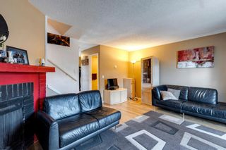 Photo 10: 128 7172 COACH HILL Road SW in Calgary: Coach Hill Row/Townhouse for sale : MLS®# A1216210