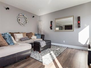 Photo 10: 18 WINDWOOD Grove SW: Airdrie House for sale : MLS®# C4082940