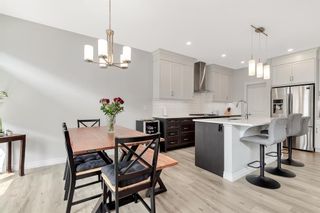 Photo 16: 138 Crestbrook Way SW in Calgary: Crestmont Semi Detached (Half Duplex) for sale : MLS®# A2050046