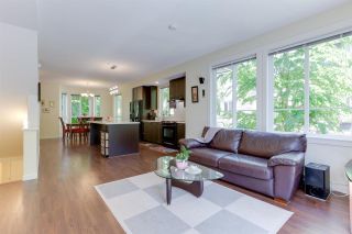 Photo 3: 110 2418 AVON Place in Port Coquitlam: Riverwood Townhouse for sale in "LINKS" : MLS®# R2583576