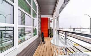 Photo 4: 370 Belmont Avenue SW in Calgary: Belmont Row/Townhouse for sale : MLS®# A1207527