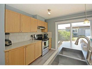Photo 10: 227 AUBURN BAY Heights SE in CALGARY: Auburn Bay Residential Detached Single Family for sale (Calgary)  : MLS®# C3630074