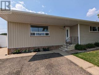 Photo 3: 1312 Division Avenue NW in Medicine Hat: House for sale : MLS®# A2076974