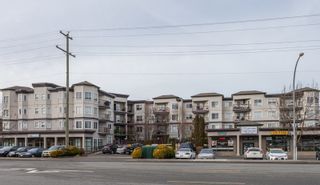 Main Photo: 418 5759 GLOVER Road in Langley: Langley City Condo for sale in "College Court" : MLS®# R2026481