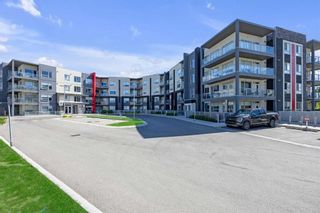 Photo 4: 123 8530 8A Avenue SW in Calgary: West Springs Apartment for sale : MLS®# A2145467