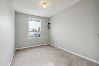 Photo 15: 29 Woodhill Court SW in Calgary: Woodlands Row/Townhouse for sale : MLS®# A2092494