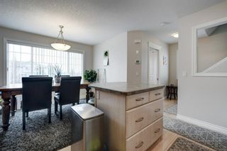 Photo 8: 10 Crystal Shores Cove: Okotoks Row/Townhouse for sale : MLS®# A1217849