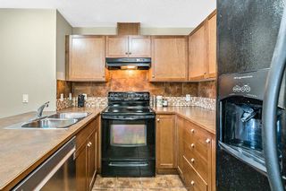 Photo 10: 2105 92 Crystal Shores Road: Okotoks Apartment for sale : MLS®# A2005622