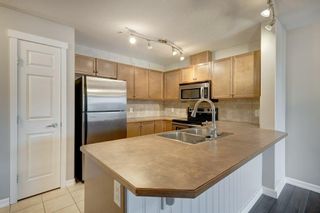 Photo 9: 2107 92 Crystal Shores Road: Okotoks Apartment for sale : MLS®# A2020691