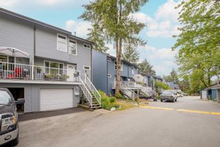 Photo 1: 457 CARLSEN Place in Port Moody: North Shore Pt Moody Townhouse for sale in "EAGLE POINT" : MLS®# R2715387