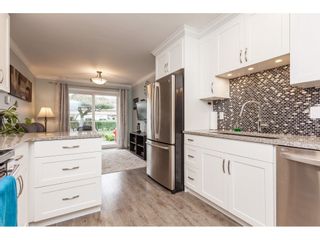 Photo 8: 136 5641 201 Street in Langley: Langley City Townhouse for sale in "The Huntington" : MLS®# R2409027