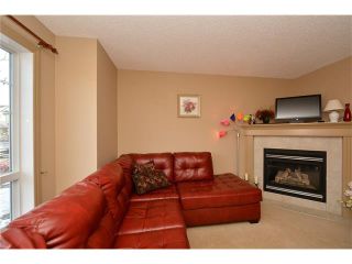 Photo 3: 202 ARBOUR MEADOWS Close NW in Calgary: Arbour Lake House for sale : MLS®# C4048885