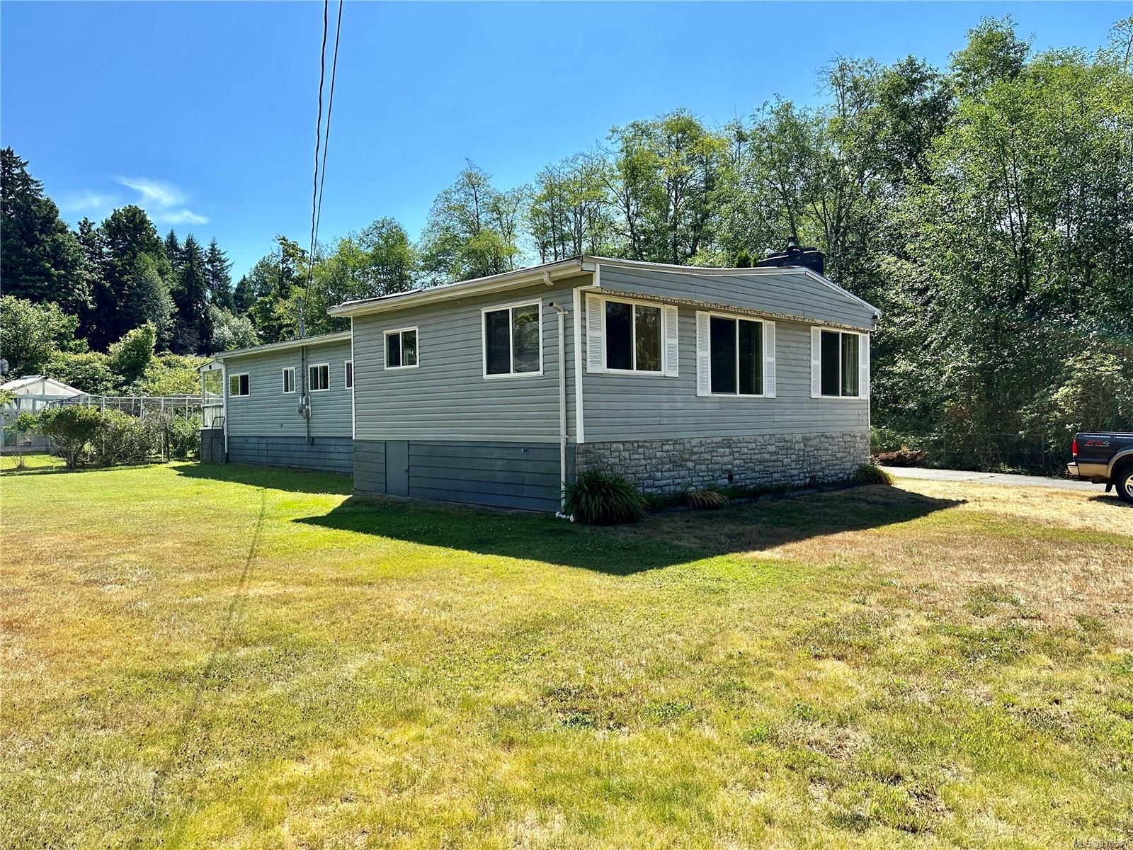 Main Photo: 605 Otter Rd in Campbell River: CR Campbell River Central Manufactured Home for sale : MLS®# 938547
