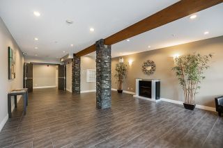 Photo 4: 405 20630 DOUGLAS Crescent in Langley: Langley City Condo for sale in "BLU" : MLS®# R2735997