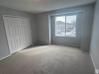 Photo 18: 20048 54A Avenue in Edmonton: Zone 58 House Half Duplex for sale : MLS®# E4380630