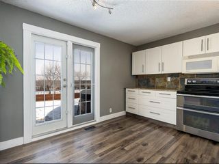 Photo 13: 70 Queen Anne Close SE in Calgary: Queensland Detached for sale : MLS®# A1194710