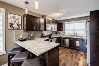 Photo 3: 1801 2461 Baysprings Link SW: Airdrie Row/Townhouse for sale : MLS®# A1228454