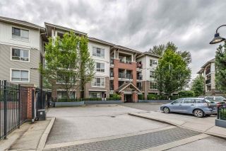 Photo 1: B412 8929 202 Street in Langley: Walnut Grove Condo for sale in "THE GROVE" : MLS®# R2476295