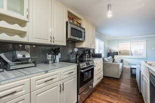 Photo 1: 297 201 CAYER Street in Coquitlam: Maillardville Manufactured Home for sale in "wildwood park" : MLS®# R2630206