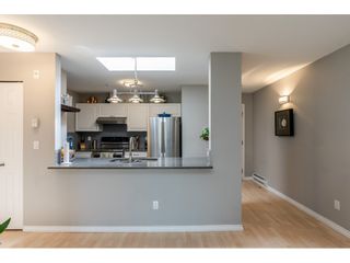 Photo 6: 407 20277 53 Avenue in Langley: Langley City Condo for sale in "THE METRO II" : MLS®# R2466451