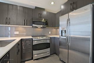 Photo 5: 217 3479 WESBROOK Mall in Vancouver: University VW Condo for sale in "ULTIMA" (Vancouver West)  : MLS®# R2066045