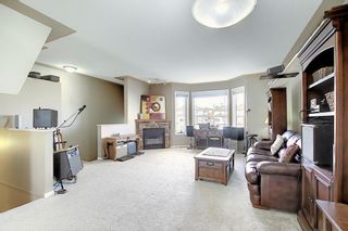 Photo 4: 121 Country Hills Gardens NW in Calgary: Country Hills Row/Townhouse for sale : MLS®# A1057496