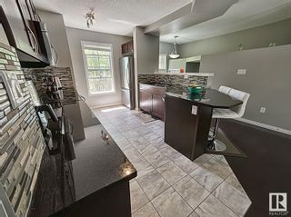 Photo 3: 51 4029 ORCHARDS Drive in Edmonton: Zone 53 Townhouse for sale : MLS®# E4307773