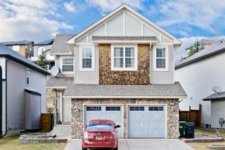 Photo 1: 319 St Moritz Drive SW in Calgary: Springbank Hill Detached for sale : MLS®# A1229853