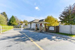 Photo 1: 206 9310 KING GEORGE Highway in Surrey: Bear Creek Green Timbers Townhouse for sale in "Huntsfield" : MLS®# R2513071