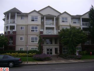 Photo 1: 105 8068 120A Street in Surrey: Queen Mary Park Surrey Condo for sale in "MELROSE PLACE" : MLS®# F1219061