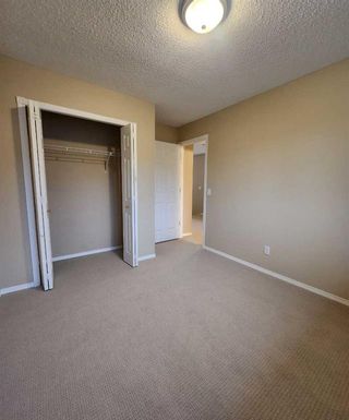 Photo 14: 406 Coral Cove NE in Calgary: Coral Springs Row/Townhouse for sale : MLS®# A2098781