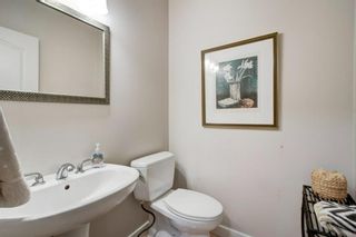 Photo 11: 65 Coach Court SW in Calgary: Coach Hill Detached for sale : MLS®# A1213514